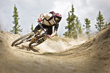 Young man riding a mountain bike, Lillehammer, Norway