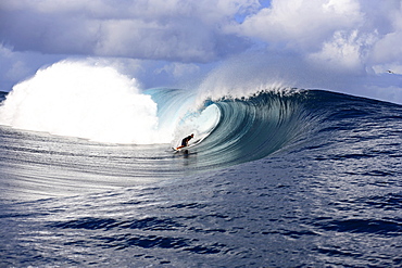 View to a barreling wave with a surfer, Teahupoo, Tahiti, French Polynesien, South Pacific