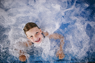 Young girl in whirlpool, Hotel Krallerhof, Leogang, Salzburger Land, Austria