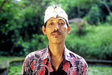 portrait of a balinese temple guide, bali, indonesia