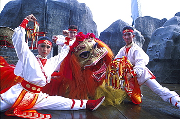 Dragon dance group, people in traditional costumes, Haw Par Villa, Singapore, Asia