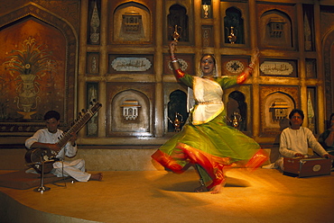 Dancer and musicians inside the Taj Mahal hotel, Dehli, India, Asia