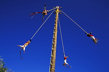 Voladores de Papantia, acrobats hanging on ropes on a fun fair, Veracruz, Mexico, America