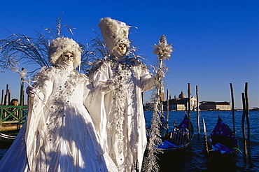 Two people in disguise at carnival, Venice, Italy, Europe