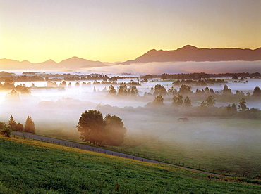 Misty landscape with Wetterstein Mountains, Upper Bavaria, Germany