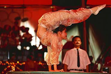 Acrobat at national circus, Saigon, Vietnam, Asia