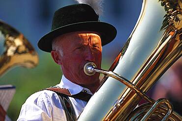 Traditional musician plays tuba, Upper Bavaria, Germany