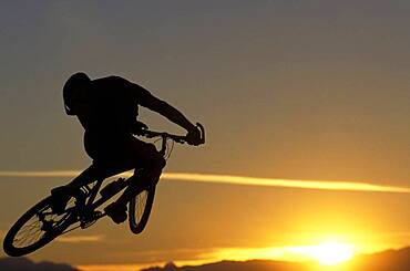 Man jumping on mountain bike