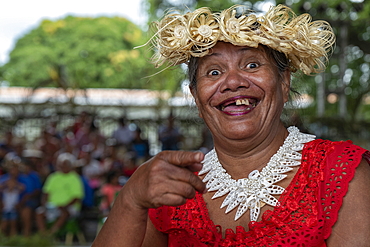 Cheerful Tahitian woman smiles with missing teeth at a cultural festival, Papeete, Tahiti, Windward Islands, French Polynesia, South Pacific