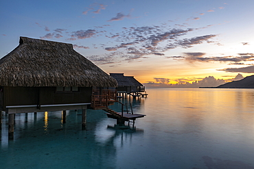 Overwater bungalows at the Hilton Moorea Lagoon Resort & Spa, Moorea, Windward Islands, French Polynesia, South Pacific