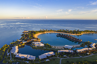 Aerial view of overwater bungalows at Fiji Marriott Resort Momi Bay at sunrise, Momi Bay, Coral Coast, Viti Levu, Fiji Islands, South Pacific