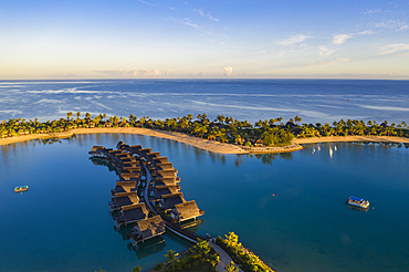 Aerial view of overwater bungalows at Fiji Marriott Resort Momi Bay at sunrise, Momi Bay, Coral Coast, Viti Levu, Fiji Islands, South Pacific