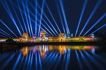 Spectacular light show at the illuminated Angkor Wat temple with reflection in the moat at night, Angkor Wat, near Siem Reap, Siem Reap Province, Cambodia, Asia