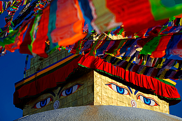 Buddha's eyes at the stupa of Bodnath, Kathmandu, Nepal, Asia.