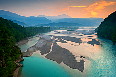 View to the natural river Tagliamento, Friulian Dolomites in the background, Friuli Region, Italy