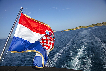 Croatian national flag on board the cruise ship, Kornati Islands National Park, Šibenik-Knin, Croatia, Europe