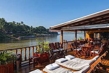 Deck chairs on board the river cruise ship Mekong Sun on the Mekong river, Luang Prabang, Luang Prabang Province, Laos, Asia