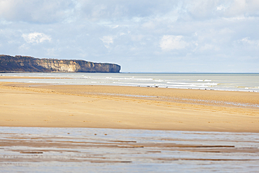 The landing beach of Omaha Beach, Lower Normandy on a sunny winter day.