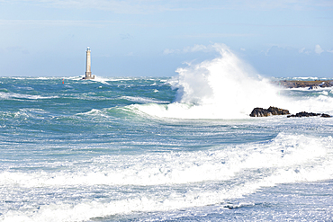 Rough seas at Goury lighthouse during a winter storm. Cotentin Peninsula, Normandy, France