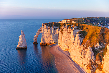 Porte d'Aval rock arch and the Aiuille rock needle on the Alabaster Coast near Étretat, Normandy, France.