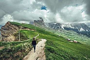 Hiker in the Dolomites, South Tyrol, Italy, Europe