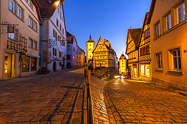 Famous fork "Plönlein" at the blue hour in Rothenburg ob der Tauber, Middle Franconia, Bavaria, Germany