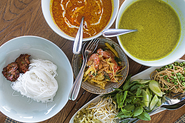 A delicious lunch is served on board river cruise ship on Tonle Sap River, Kampong Chhnang, Cambodia, Asia