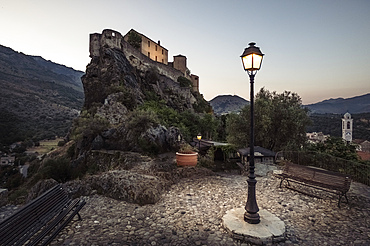 Citadel and street lamp at dusk, Corte, "the secret capital of Corsica", Corsica, France.