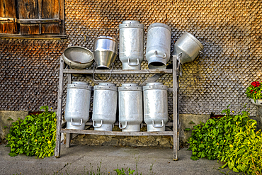 Milk churns on a farm in Innervillgraten, Villgratental, East Tyrol, Tyrol, Austria