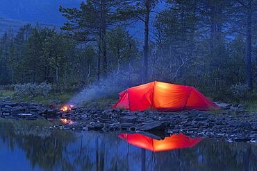Red tent, campfire, Sefrivatnet, Tosfjellet, Nordland, Norway