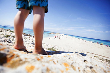 Boy on the beach, les Illetes und Llevant beach, Formentera, Balearic Islands, Spain