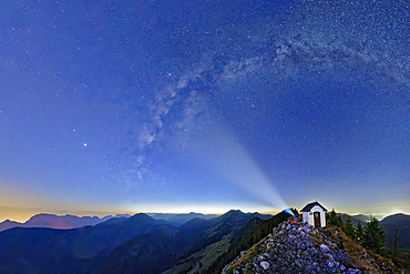 Milky Way spans the starry sky with a view of the Inn Valley, Brünnstein, Mangfall Mountains, Bavarian Alps, Upper Bavaria, Bavaria, Germany