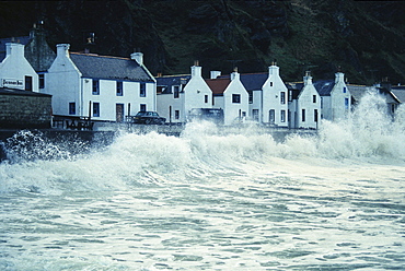 Waves breaking at the harbour wall, Pennan, Highlands, Grampian, Aberdeenshire, Scotland, Great Britain, Europe