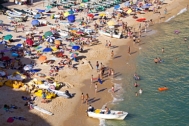 Tourists on the beach Praia da Senhora da Rocha, Armacao de Pera, Algarve, Portugal