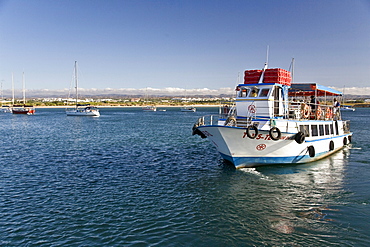 Boat to the island Ilhe de Tavira, crossing the laguna, Tavira, Algarve, Portugal