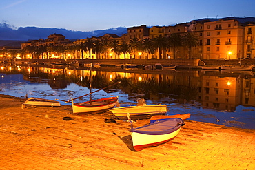 Boats, dusk, view at the city houses, river Fiume Temo, Bosa, Sardinia, Italy, Europe