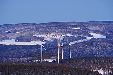 View from the mountain Kandel over the Black Forest with wind energy plant and the village of Neukirch, Baden-Wuerttemberg, Germany, Europe