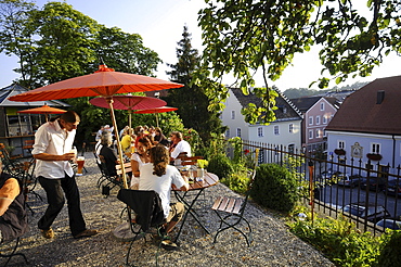 Guest on terrace of a restaurant, Murnau, Bavaria, Germany