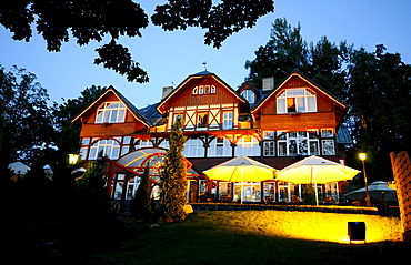 View at the illuminated Hotel Rezydencia Karpacz in the evening, Karpacz, Bohemian mountains, lower-Silesia, Poland, Europe