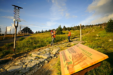 Hikers with child at Slenskesedlo-Pass in the sunlight, Bohemian mountains, east-bohemian, Czech Republic, Europe