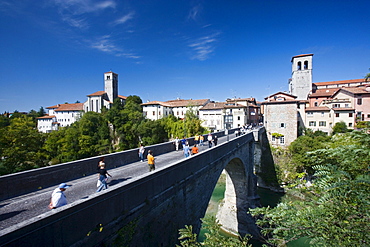 Natisone river spanned by Devil's bridge (15th century, rebuilt in 1918), Cividale del Friuli, Friuli-Venezia Giulia, Italy