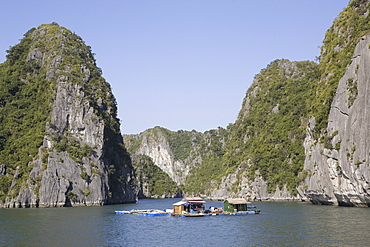 Floating fishing houses at the Halong Bay at the Gulf of Tonkin, Vietnam, Asia