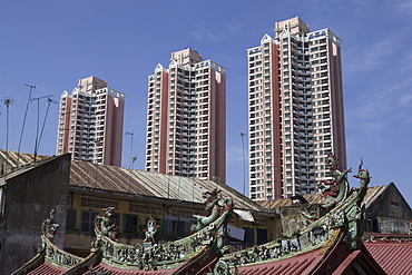 High rise buildings behind a chinese temple at Cholon, Saigon, Hoh Chi Minh City, Vietnam, Asia