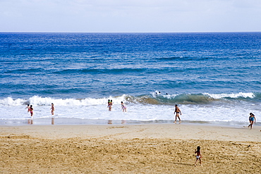 Children playing on Porto Santo Beach, Vila Baleira, Porto Santo, near Madeira, Portugal