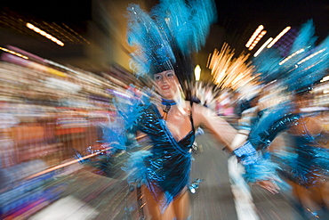 Women in colourful costumes at the Carnival Parade, Funchal, Madeira, Portugal