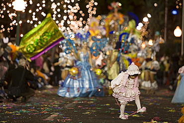 Young girl dancing at the Carnival Parade, Funchal, Madeira, Portugal