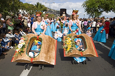 Mothers and children at the Madeira Flower Festival Parade, Funchal, Madeira, Portugal