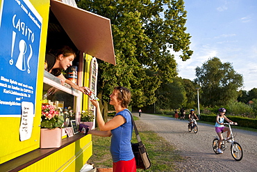 Customer at a kiosk, Leipzig, Saxony, Germany