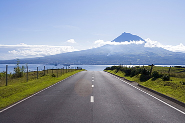 Road with view towards Pico Island, Horta, Faial Island, Azores, Portugal, Europe