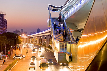 Cars and pedestrians on the street in the evening, Lianqian West Road, Huli District, Xiamen, Fujian, China, Asia